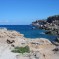 Bucht mit Leuchtturm an der Nordküste Ibizas