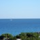 A lonely sailboat on the horizon